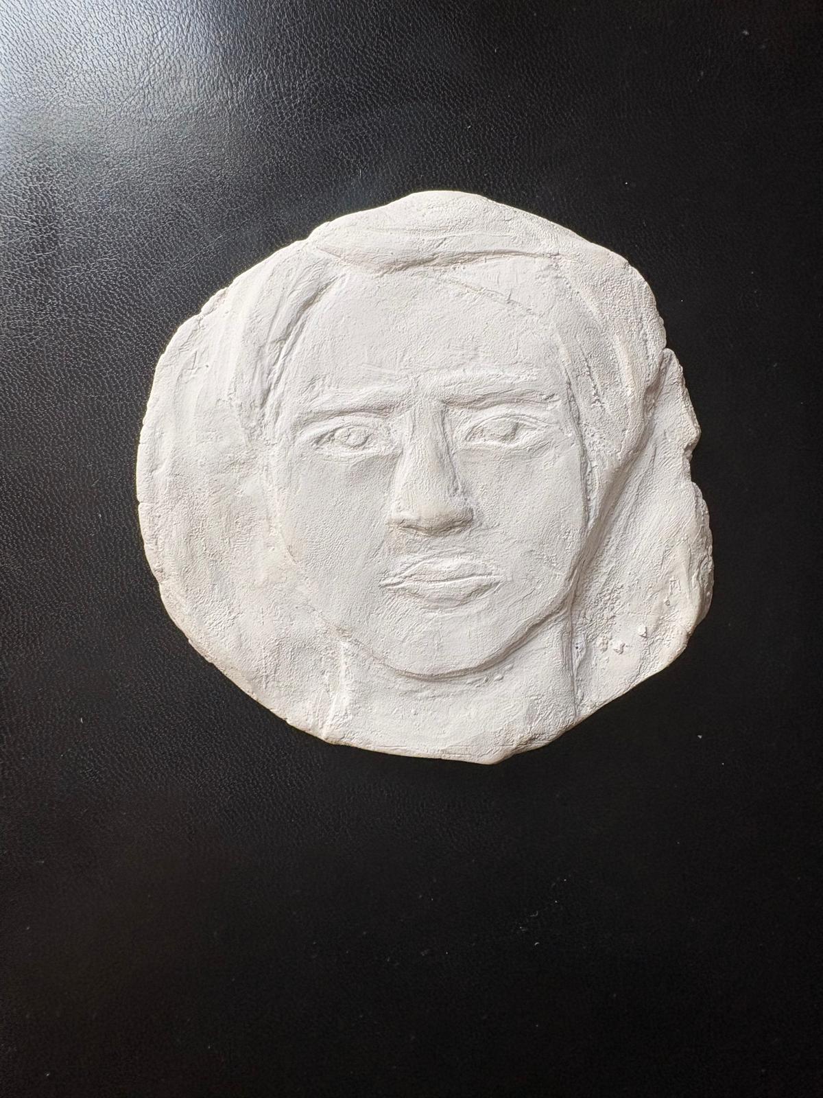 Relief Art — first clay face